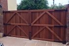 Sapele hardwood gates treated brown